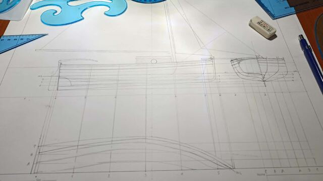 Hand-drawn yacht lines plan with drafting tools, representing the Yacht Design & Naval Architecture courses at Seamanship Academy